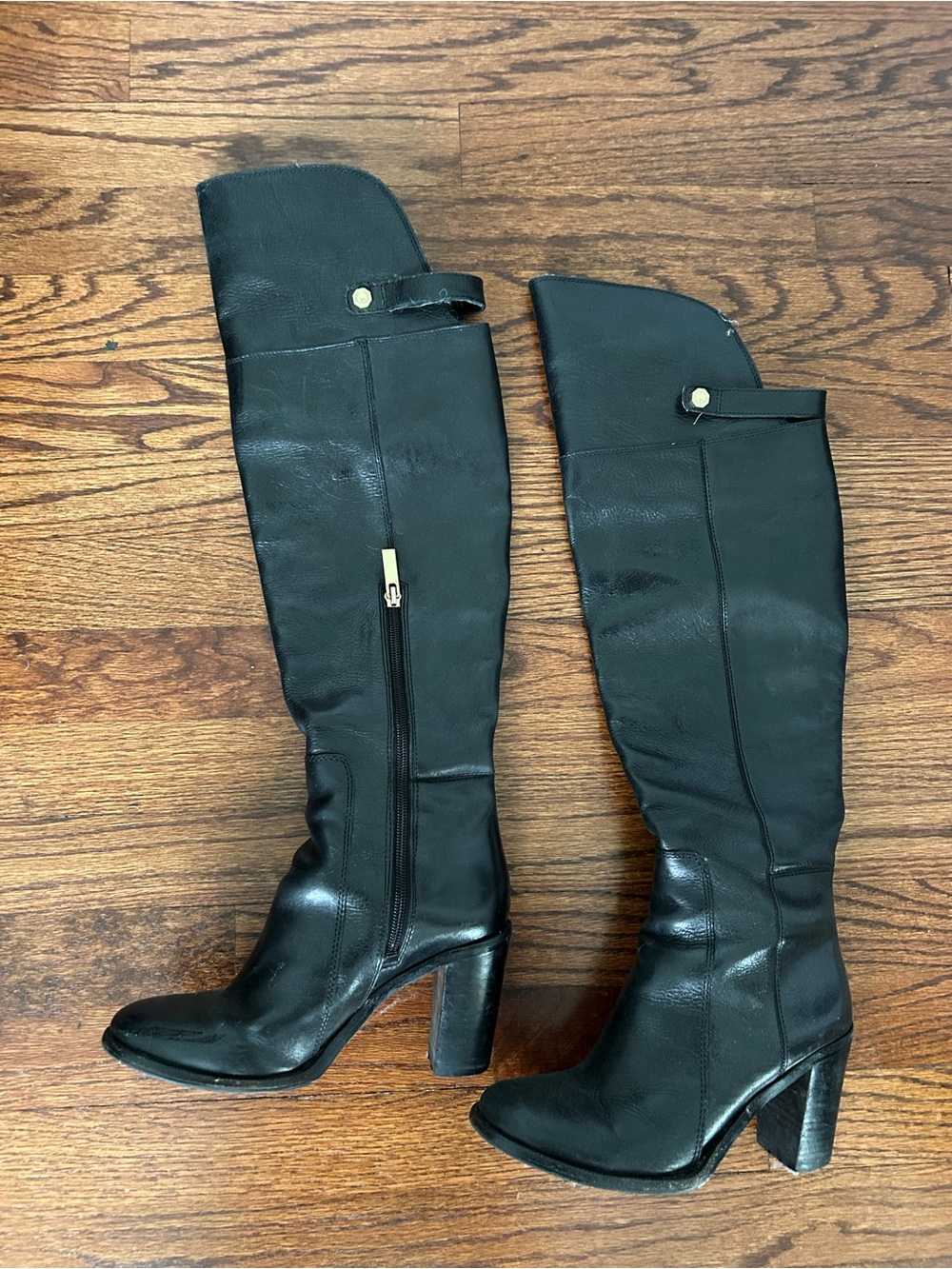 Vintage black leather knee high boots